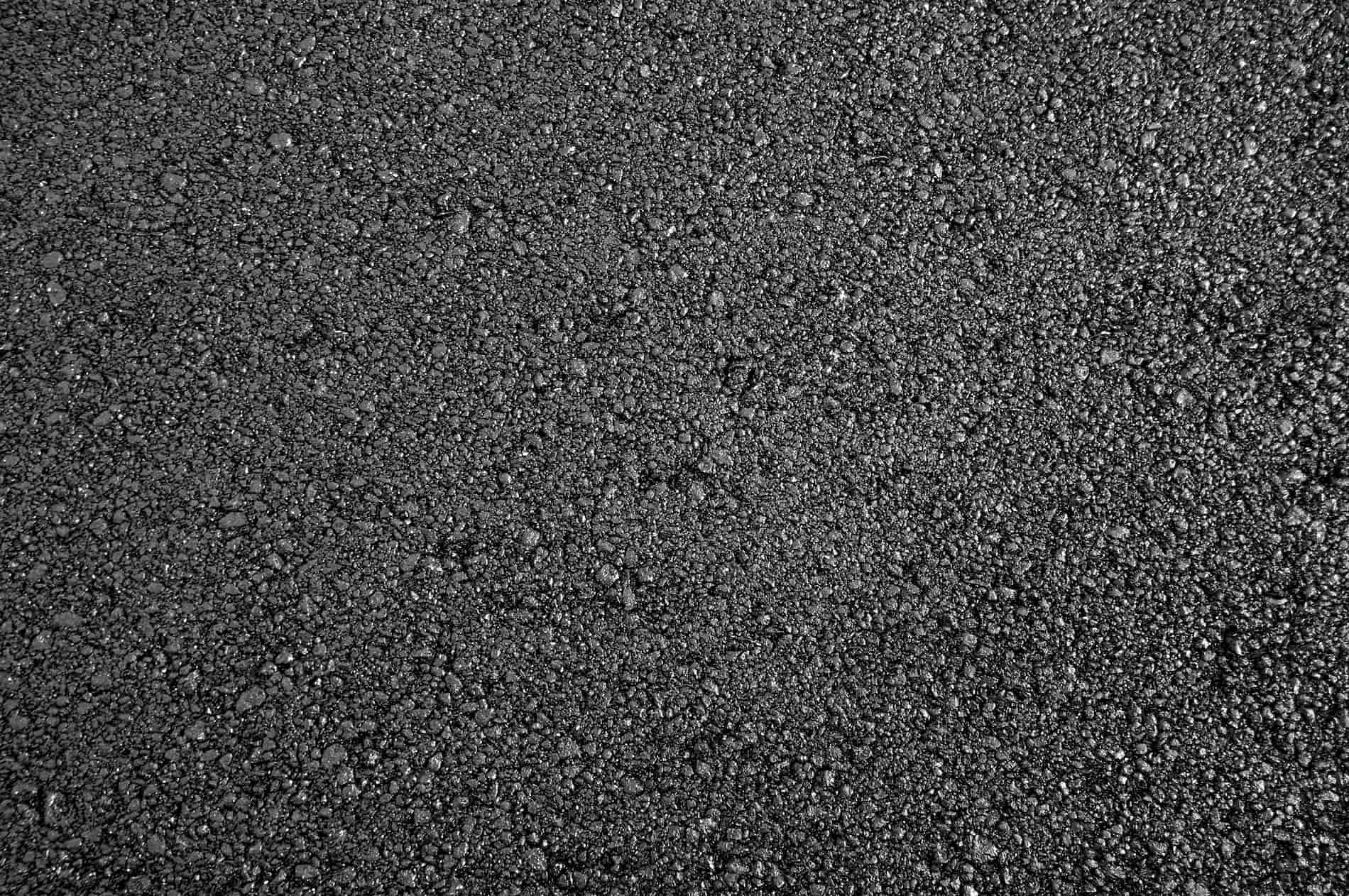 a close up of asphalt just after being compacted